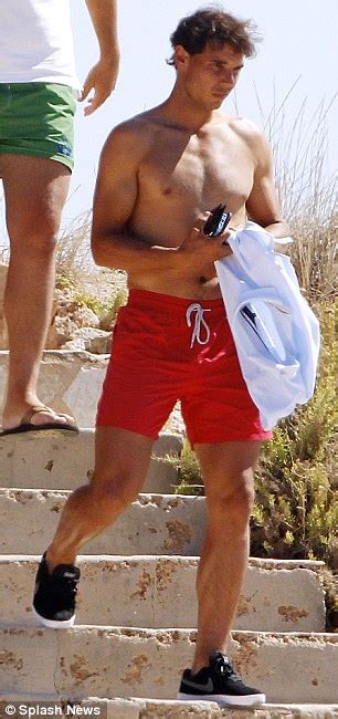 Rafael Nadal Strips Down To Tiny Red Shorts As He Soaks Up The