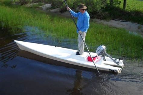 Solo Skiff The One Man Powered Boat A Fishing Kayak Skiff And Sup