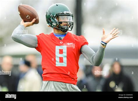 Oregon Ducks' quarterback Marcus Mariota throws a pass during practice ...