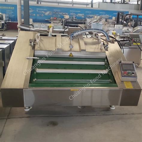 Auto Continuous Rolling Vacuum Packaging Machine For Meat China