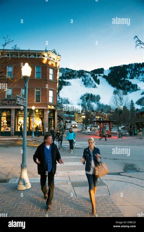 USA, Colorado, Aspen, people walk through the sqare in downtown Aspen ...