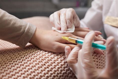 Premium Photo Doctor Doing Stem Cell Therapy On A Patient S Elbow