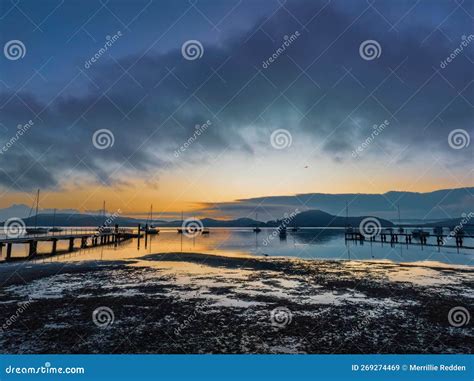 Soft And Hazy Aerial Sunrise Waterscape With Boats Stock Image Image