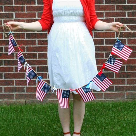 Make This Patriotic Garland Out Of Mini American Flags And Ribbon