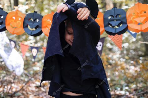 Premium Photo | Happy boy kid in halloween costume having fun in ...