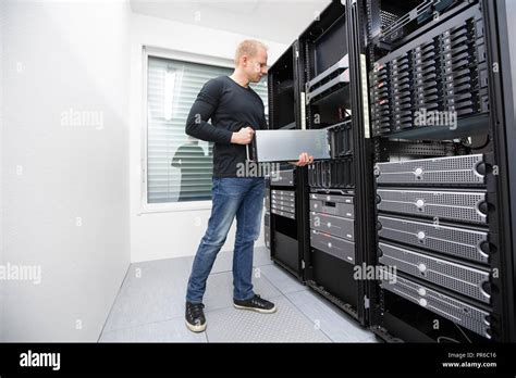 It Consultant Install Blade Server In Datacenter Stock Photo Alamy