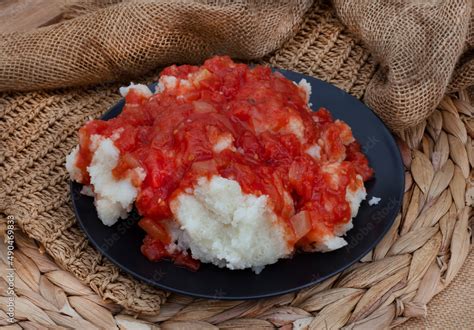 Traditional South African Pap and sous, maize meal covered in tomato ...