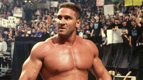 Download Ken Shamrock Amid Cheering Crowd Wallpaper