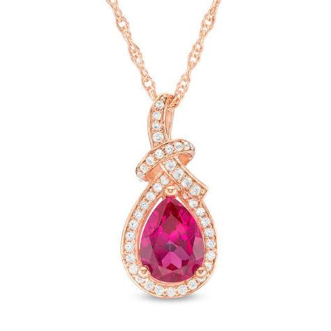 Pear Shaped Ruby And Ct T W Diamond Frame Loop Knot Pendant In