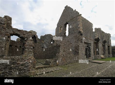 Inner walls and interior of Dunluce Castle, a medieval castle on the ...