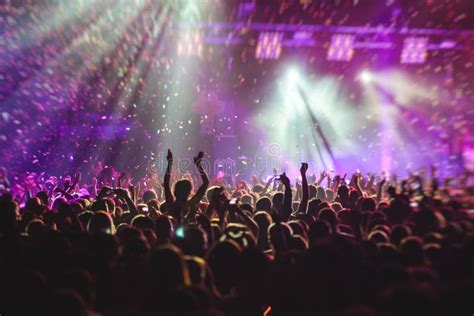 View Of Rock Concert Show In Big Concert Hall With Crowd And Stage