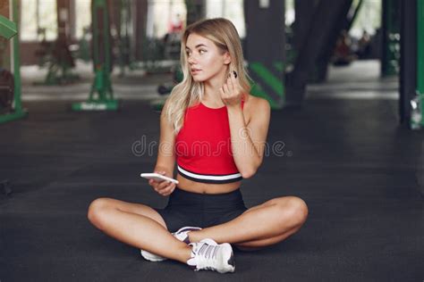 Sports Blonde In A Sportswear Have A Rest In A Gym Stock Photo Image