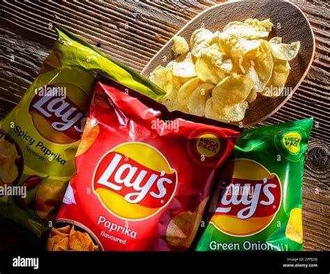 Composition With Packets Of Lays Potato Chips Stock Photo Alamy