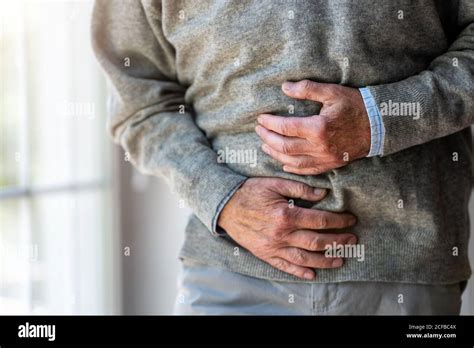 Senior Man With Stomach Pain Stock Photo Alamy