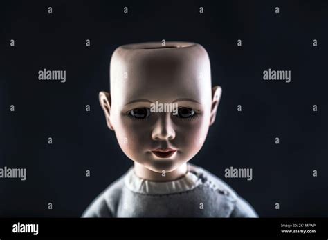 Creepy Doll Face On Dark Background Stock Photo Alamy