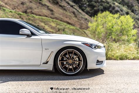 Captivating Infiniti Q60 With White Exterior Color And Bronze Rims