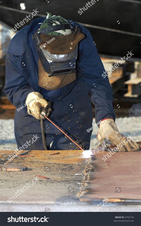 Welder At Shipyard Working On Steel Project Stock Photo 6792718