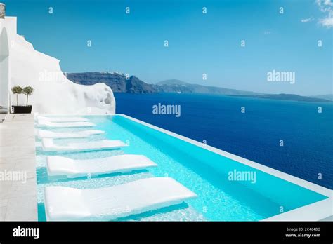 Infinity Pool Santorini Greece Looking Out Over The Caldera Of The