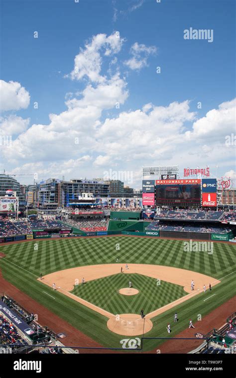 Blue Skies And White Clouds Shine Over Nationals Park Baseball Stadium