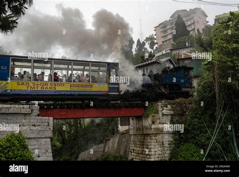 DARJEELING INDIA MAY 25 Tourists Travel In A Steam Loco Engined Toy