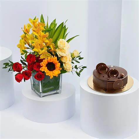 Online Mix Flowers and Chocolate Fudge Combo Gift Delivery in UAE - FNP