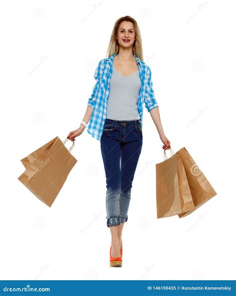 Front View Of A Woman Walking With Shopping Bags Stock Image Image Of