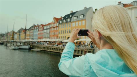 The Tourist Photographs The Famous Houses On The Nyhavn Canal Tourism