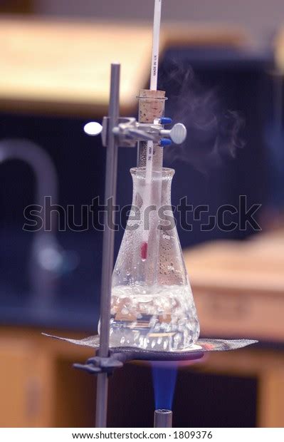 Water Boiling Beaker Over Bunsen Burner Stock Photo Edit Now