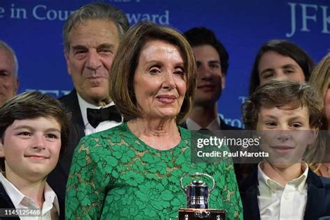 Speaker Nancy Pelosi onstage flanked by grandchildren Thomas and Paul ...