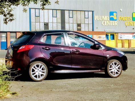 Radiant Ebony looks amazing in the sun. My 2011 Mazda 2. : mazda