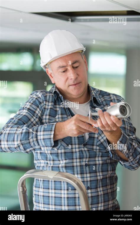 Inspecting The Camera Stock Photo Alamy