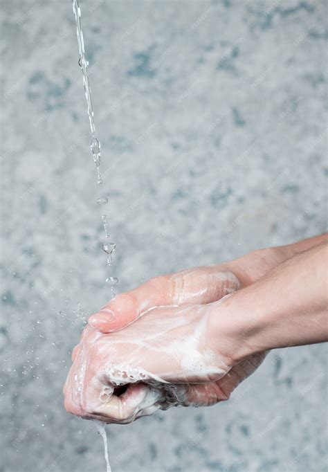 Premium Photo | Hand washing with soap.