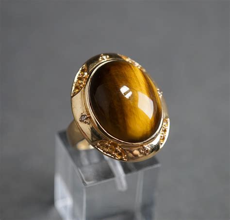 Lot 14 Karat Yellow Gold And Tigers Eye Chrysoberyl Ring 58 Gross