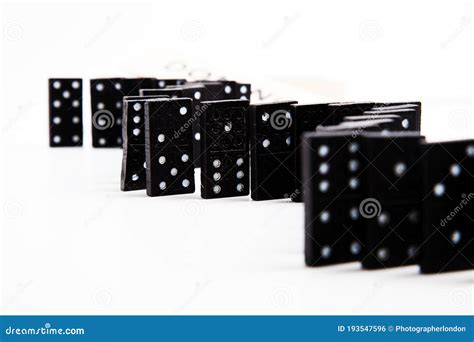 Studio Shot Of Dominos Lined Up Stock Photo Image Of Business