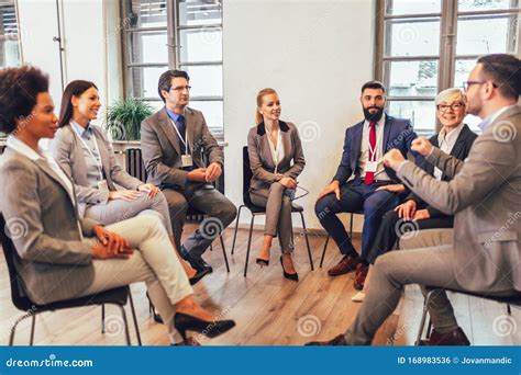 Modern Business People Sit In Circle Discussing Business Ideas Steps