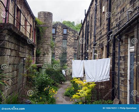 A Row Of Typical Traditional Yorkshire Stone Houses In A Small Terraced