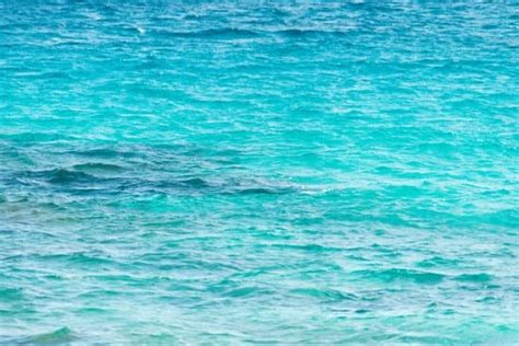 vibrant blue ocean water - Photos by Canva