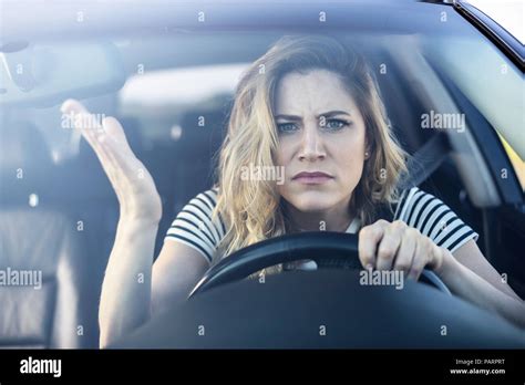 Angry Woman Driving A Car Stock Photo Alamy