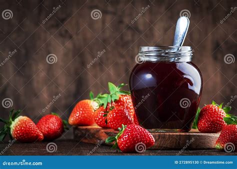 Strawberry Jam In Glass Jar And Fresh Berries Rustic Wooden Table