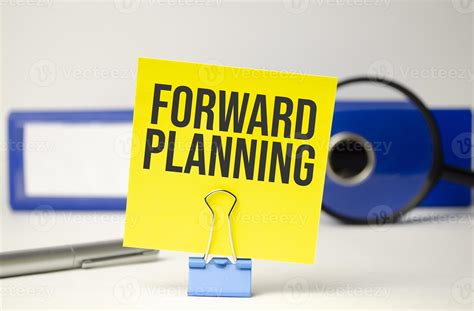 Yellow Sticker Paper Folder Pen And Forward Planning Words 14903704