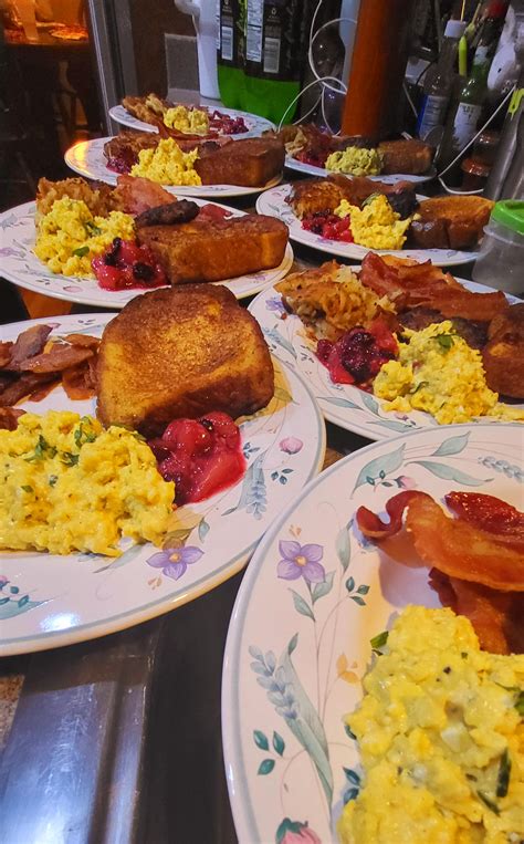 [homemade] Scrambled Eggs French Toast Hash Browns Bacon And Fruit Compote For Seven R Food