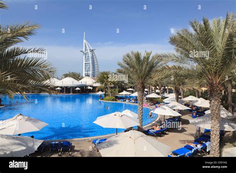 Burj Al Arab Seen From The Swimming Pool Of The Madinat Jumeirah Hotel