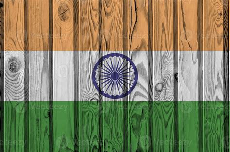 India Flag Depicted In Bright Paint Colors On Old Wooden Wall Textured