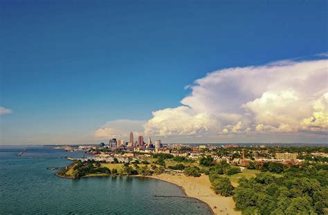 Edgewater Park Beach And Cleveland Photograph by Linas Muliolis - Pixels