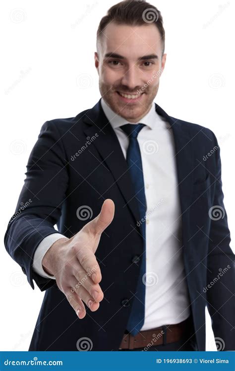 Cheerful Businessman Reaching For A Hand Shake And Smiling Stock Image