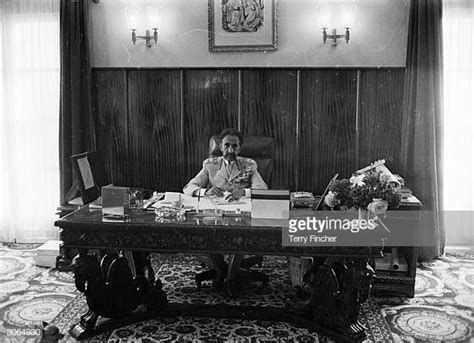 Emperor Haile Selassie of Ethiopia at his desk in the palace office ...