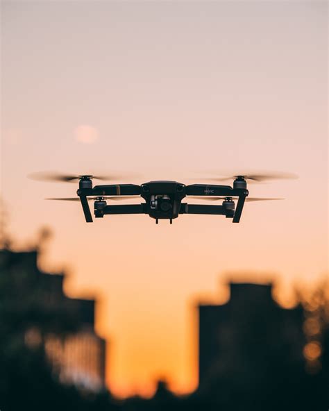 Selective Focus Photography Of Quadcopter Drone In Mid Air Drone Mavic Fly Air Bokeh Blur