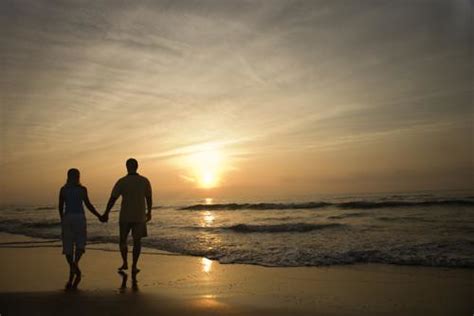 Couple Walking On Beach At Sunset Flickr Photo Sharing