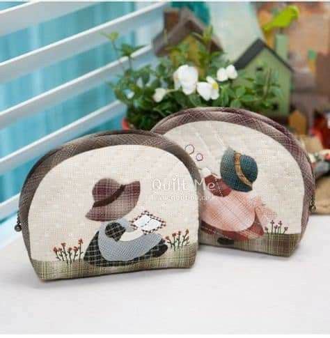 Three Coin Purses Sitting On Top Of A Table