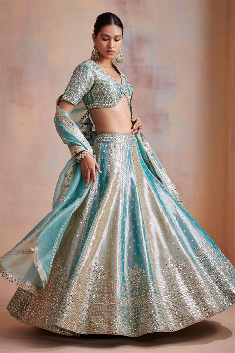 Buy Blue Tissue Embroidered Mirror Work V Neck Lehenga Set For Women By